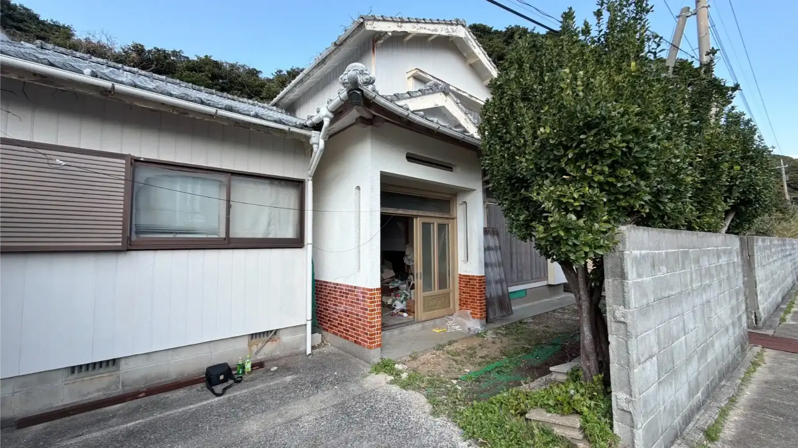 Traditional wooden house facade on Naru Island in Goto